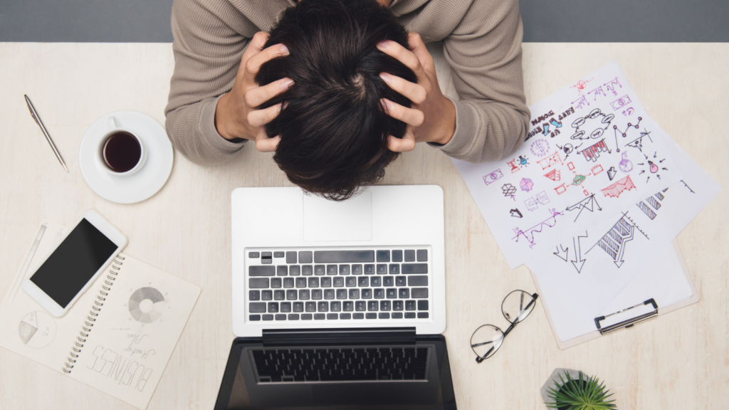 stressed person at computer stock imagery